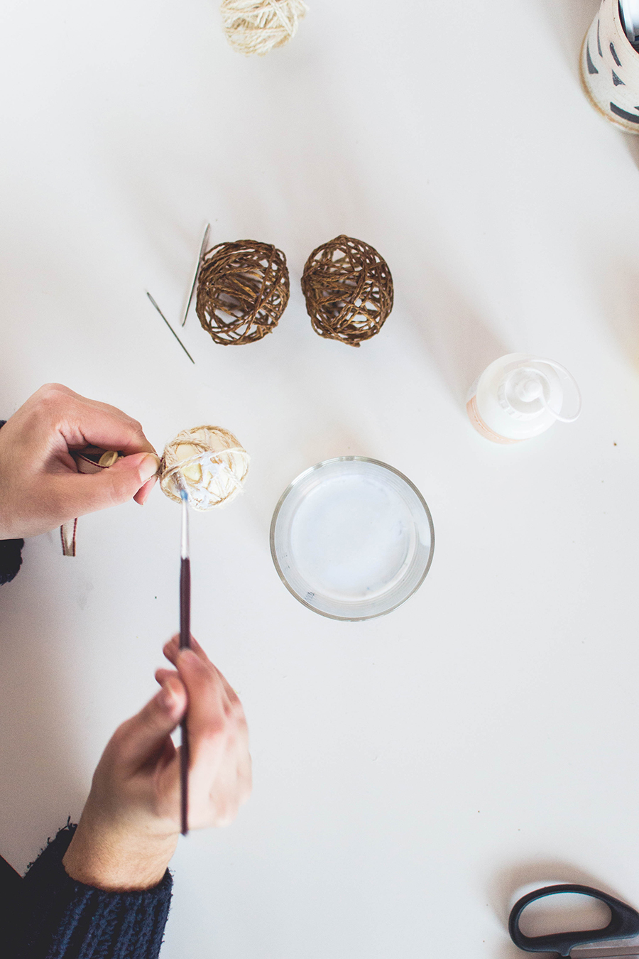 Make a twine sphere for your DIY winter scented garland