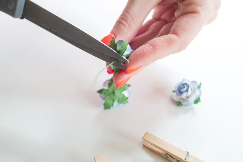 cut the paper flowers to make diy flower clothespins