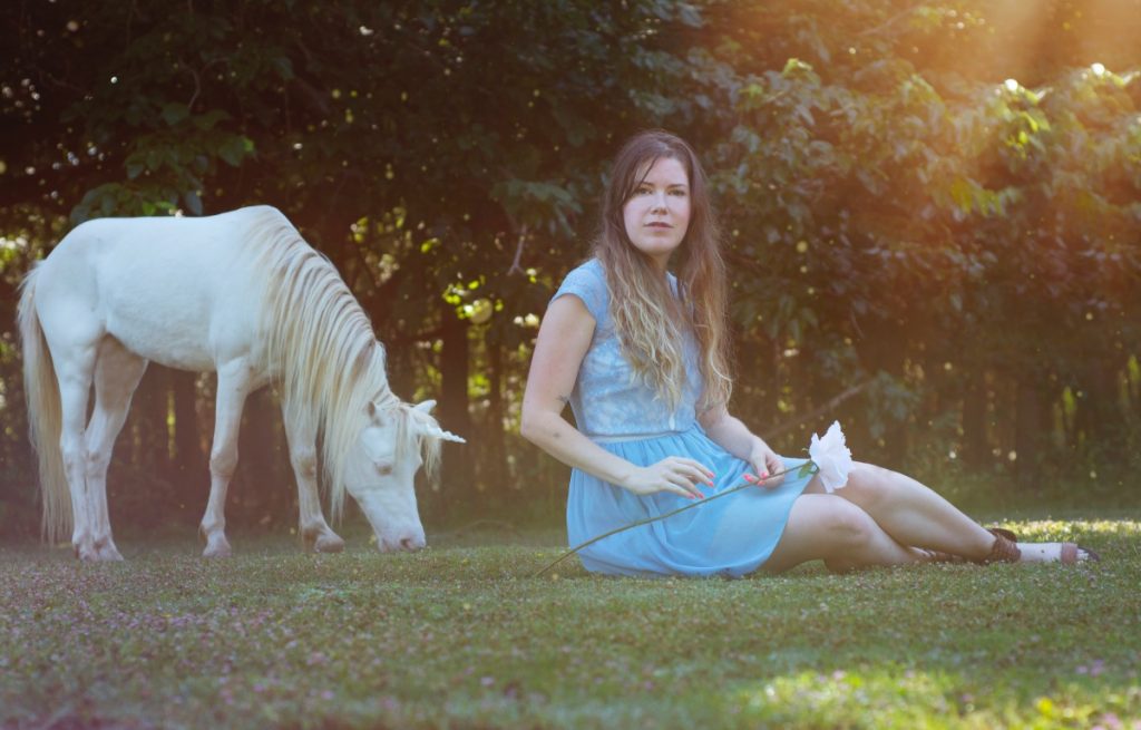 unicorn in a meadow with brittany bly photograph