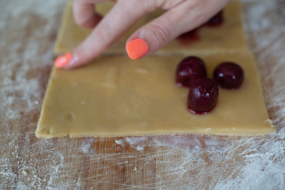 press water to the edges to make easy hand pies with cherries