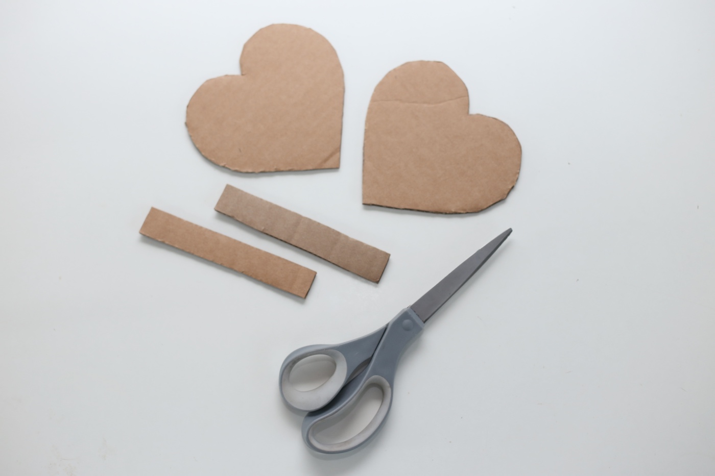 cut cardboard to make a diy heart pinata