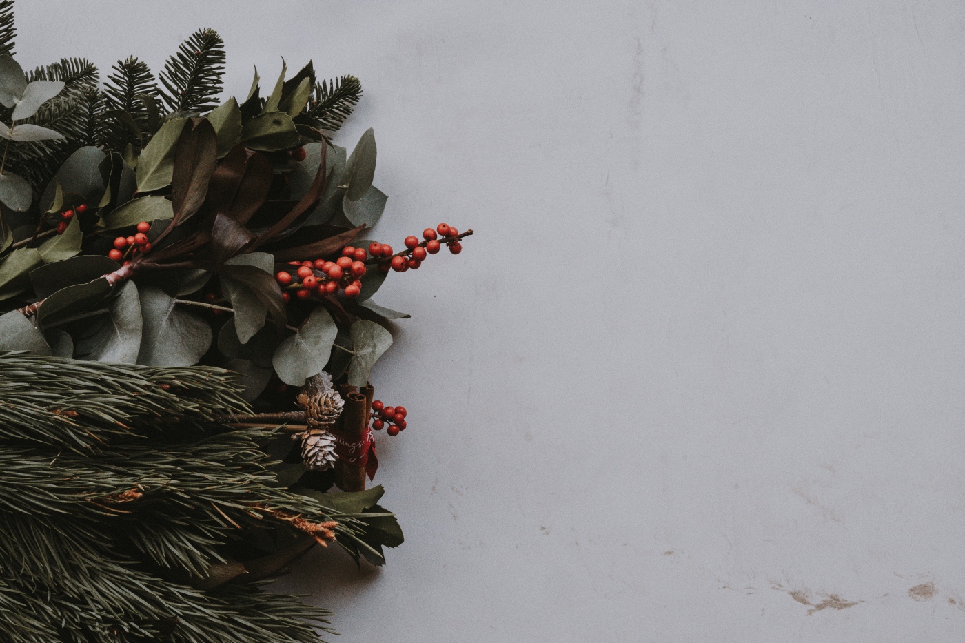 pinecones, pine, and greens to add to a winter bouquet of flowers