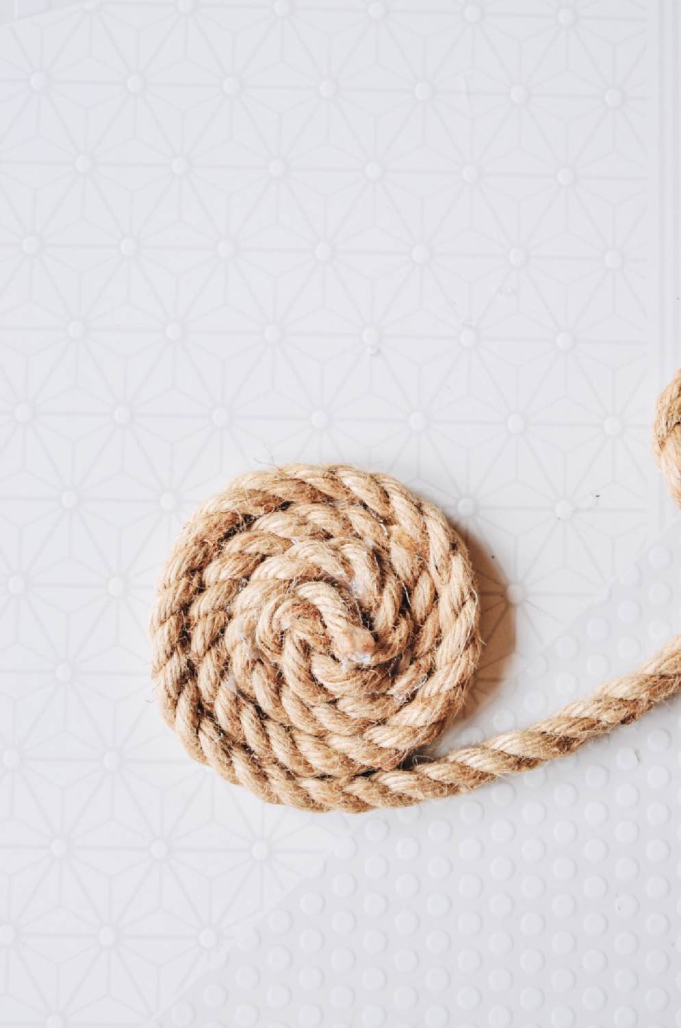 continue to wind the rope diy rope trivet craft tutorial