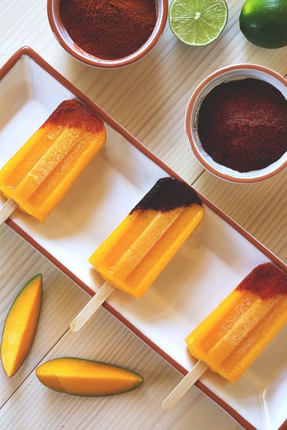 tequila spiked mango posicles with chile