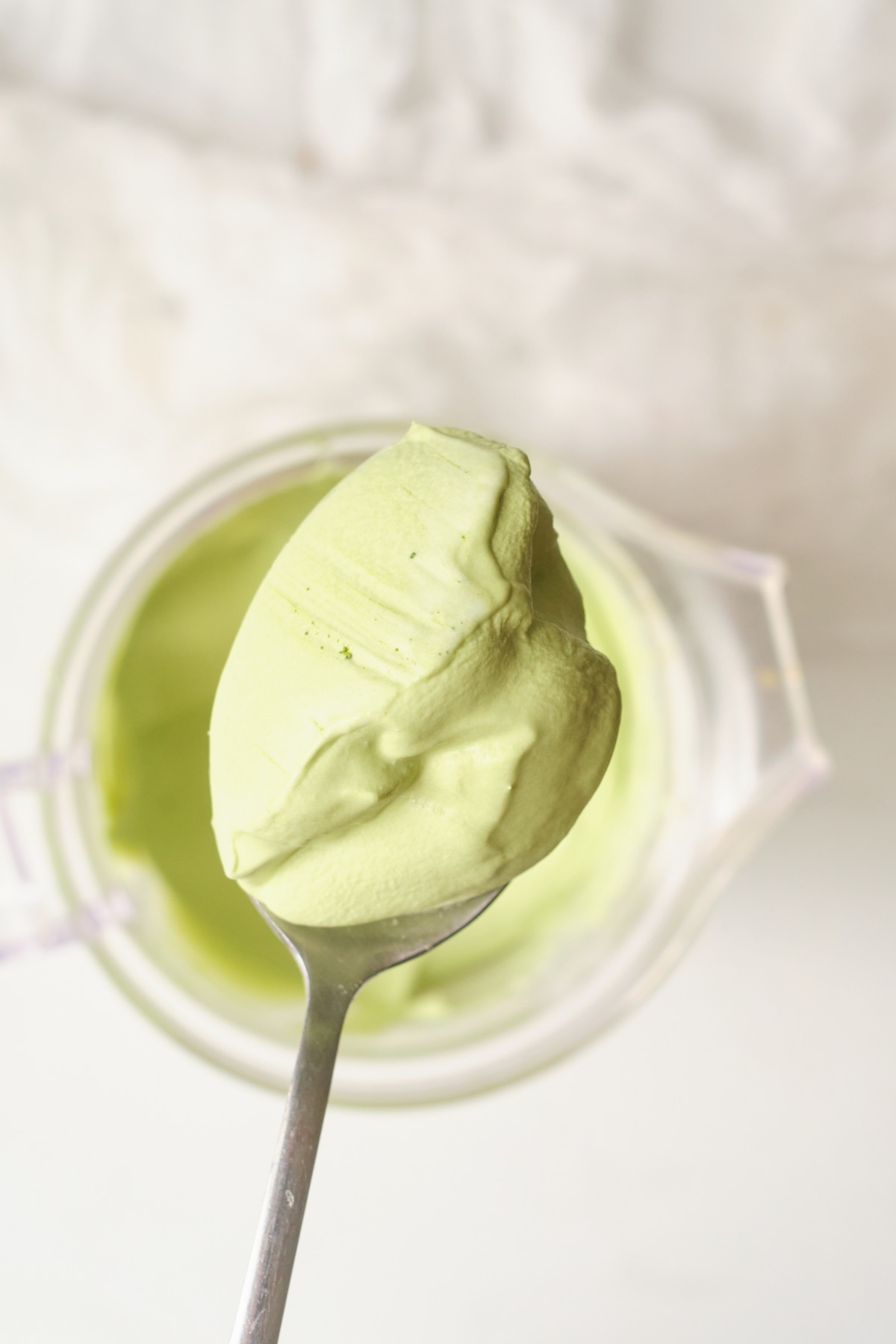  scoop the whipped matcha to place on a latte