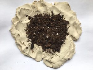 add soil to clay to make diy clay seed bombs pop shop america
