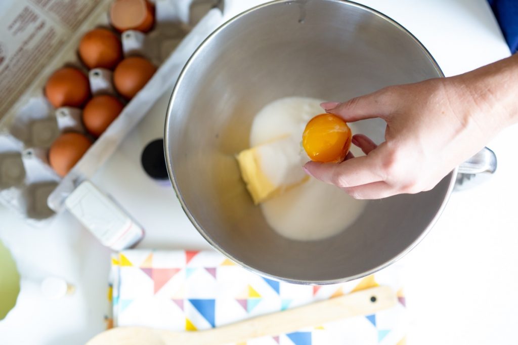 add the yolk to sugar and butter - rainbow glitter sugar cookies