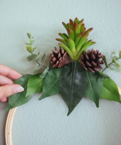 placing-the-leaves-and-plants-pop-shop-america-wreath-diy_square
