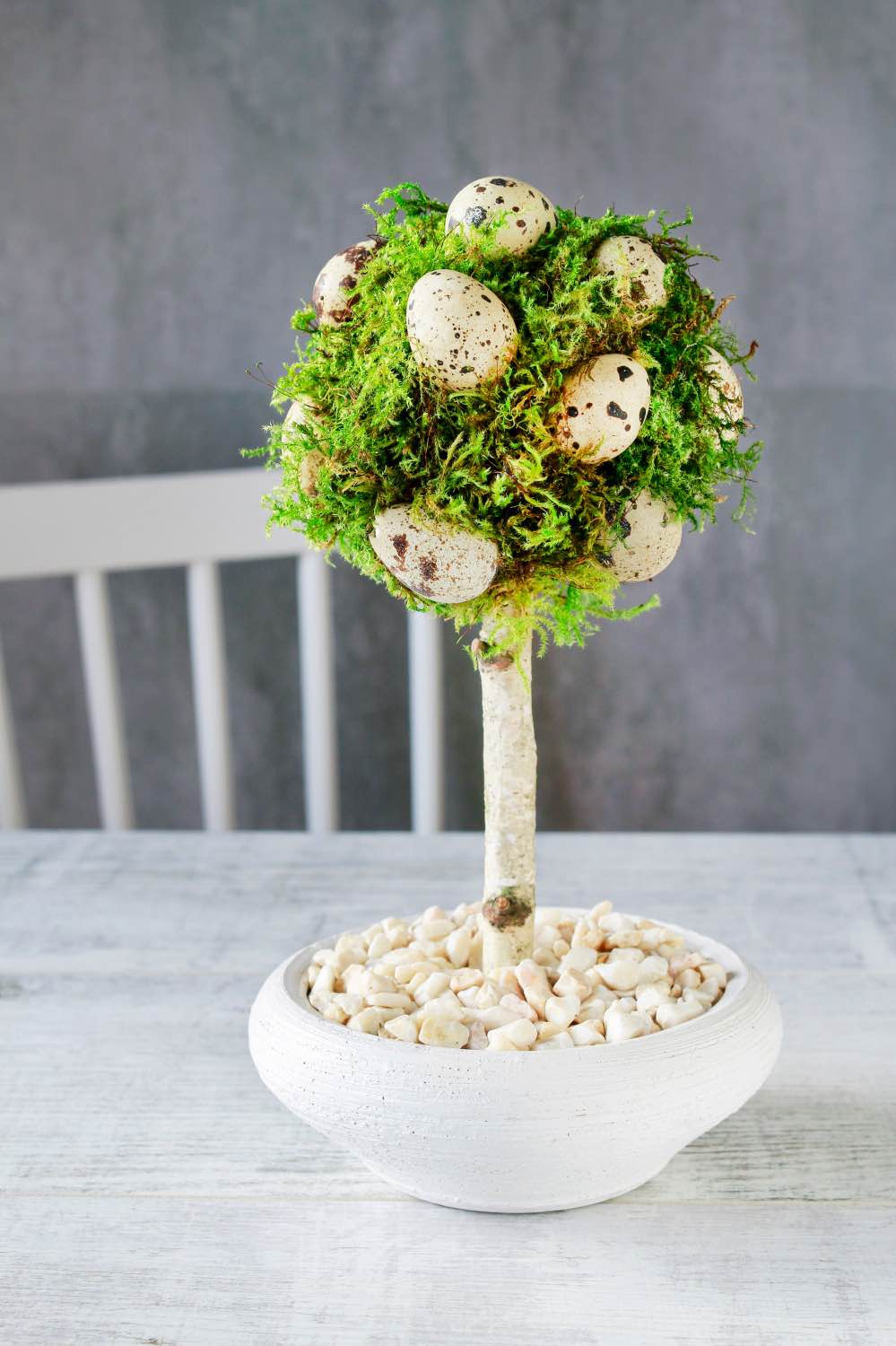 finished natural egg and moss topiary easter decoration