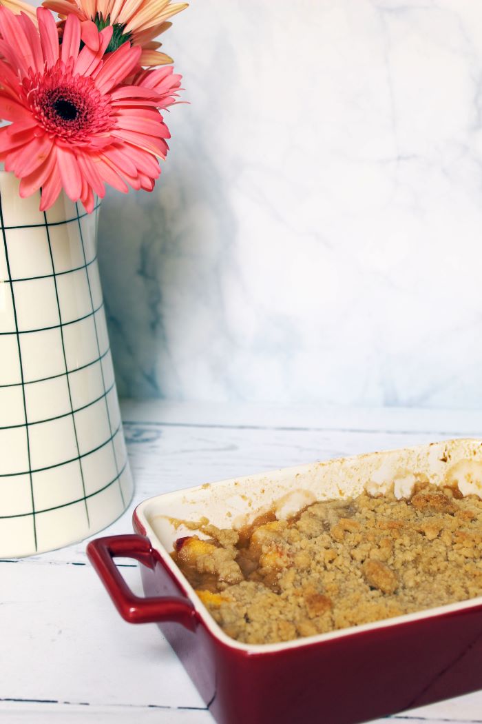 Bourbon Peach Crumble in Red Pan with Vase
