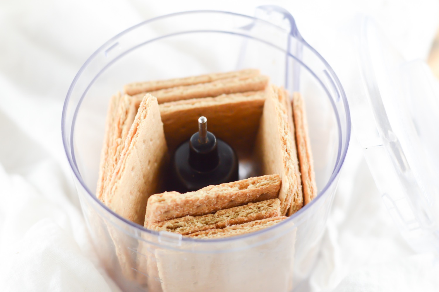crush the graham crackers in the food processor