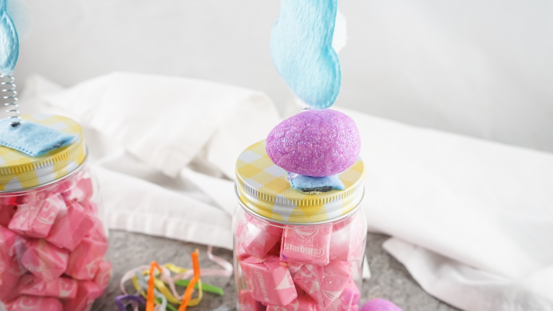attach the easter eggs to the easter basket stuffer