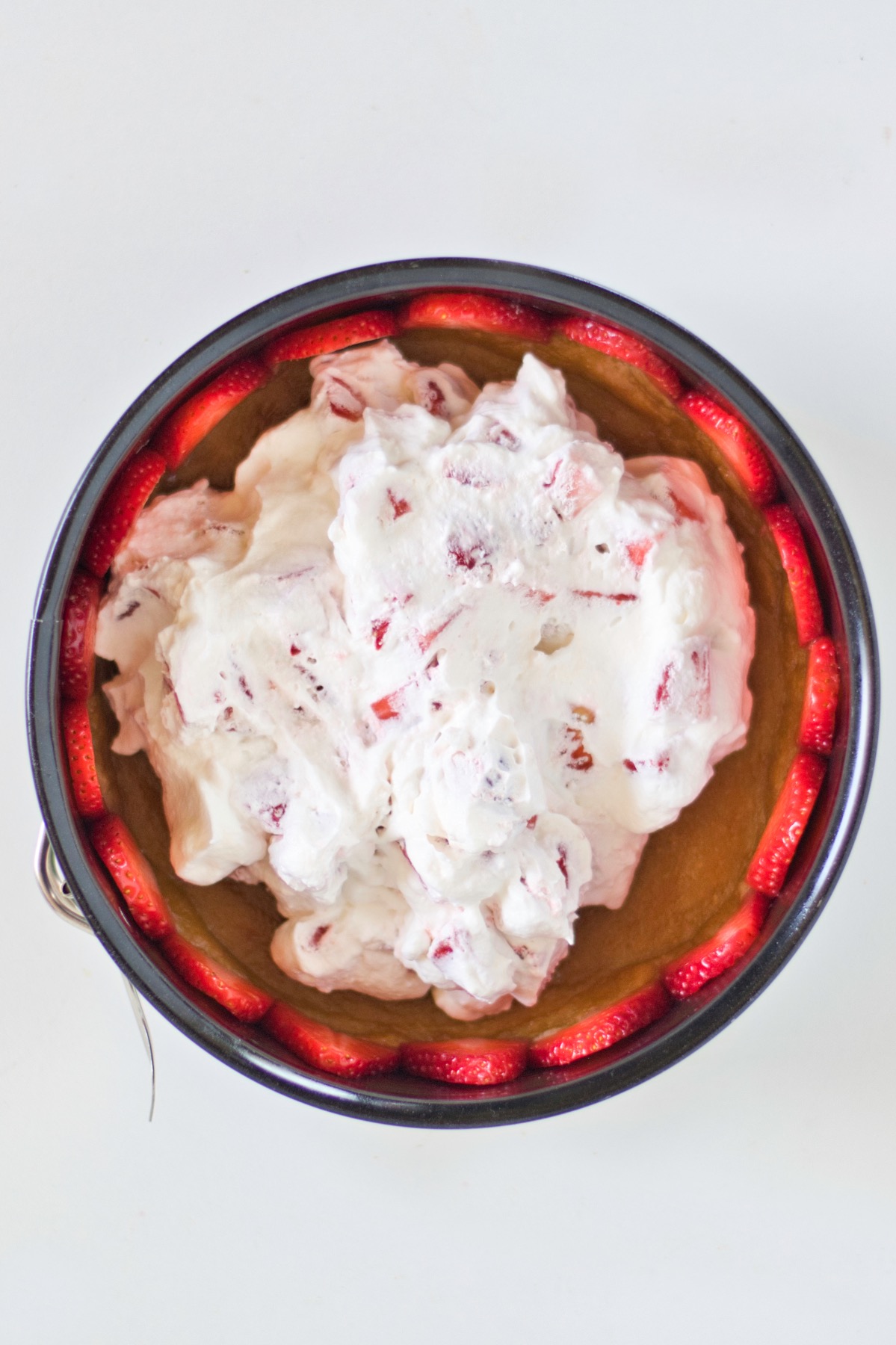 add the whipped cream to the strawberry cream tart