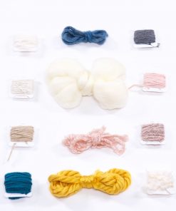 flatlay of yarn and twine in full kit diy weaving loom craft supply