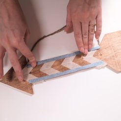 taped chevron on a wood arrow diy tutorial square