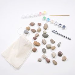supplies to make a rock domino set with acrylic paint
