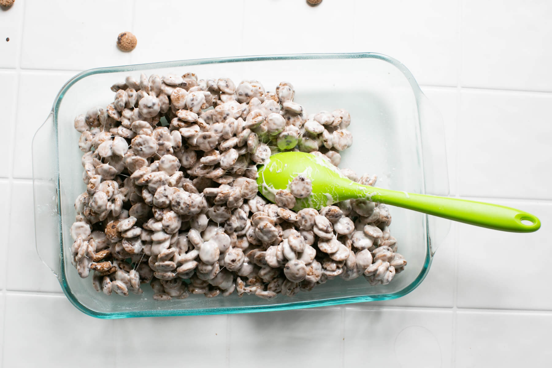 spread the cookie crisp treats into the baking pan