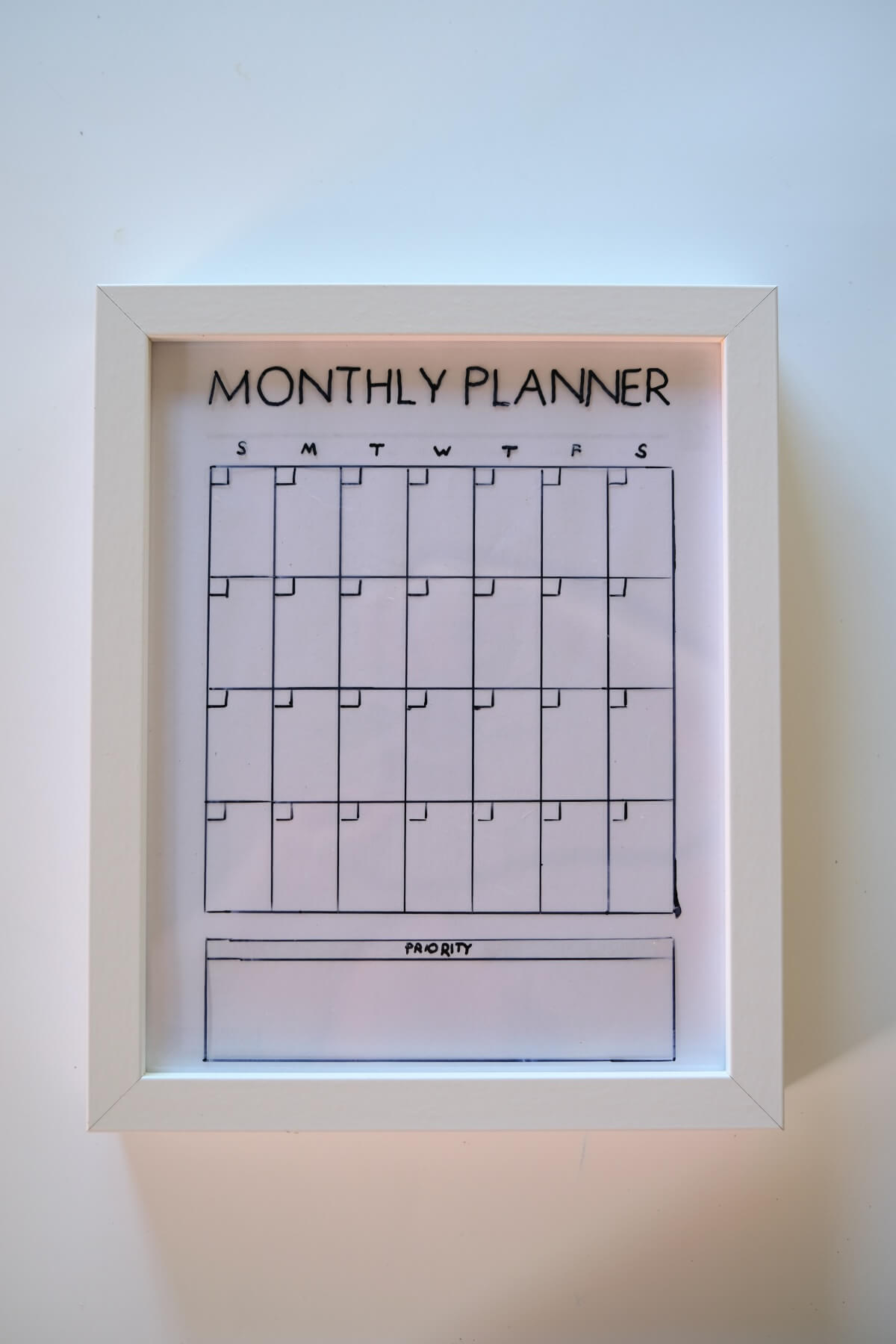 finished monthly calendar in a frame diy command center