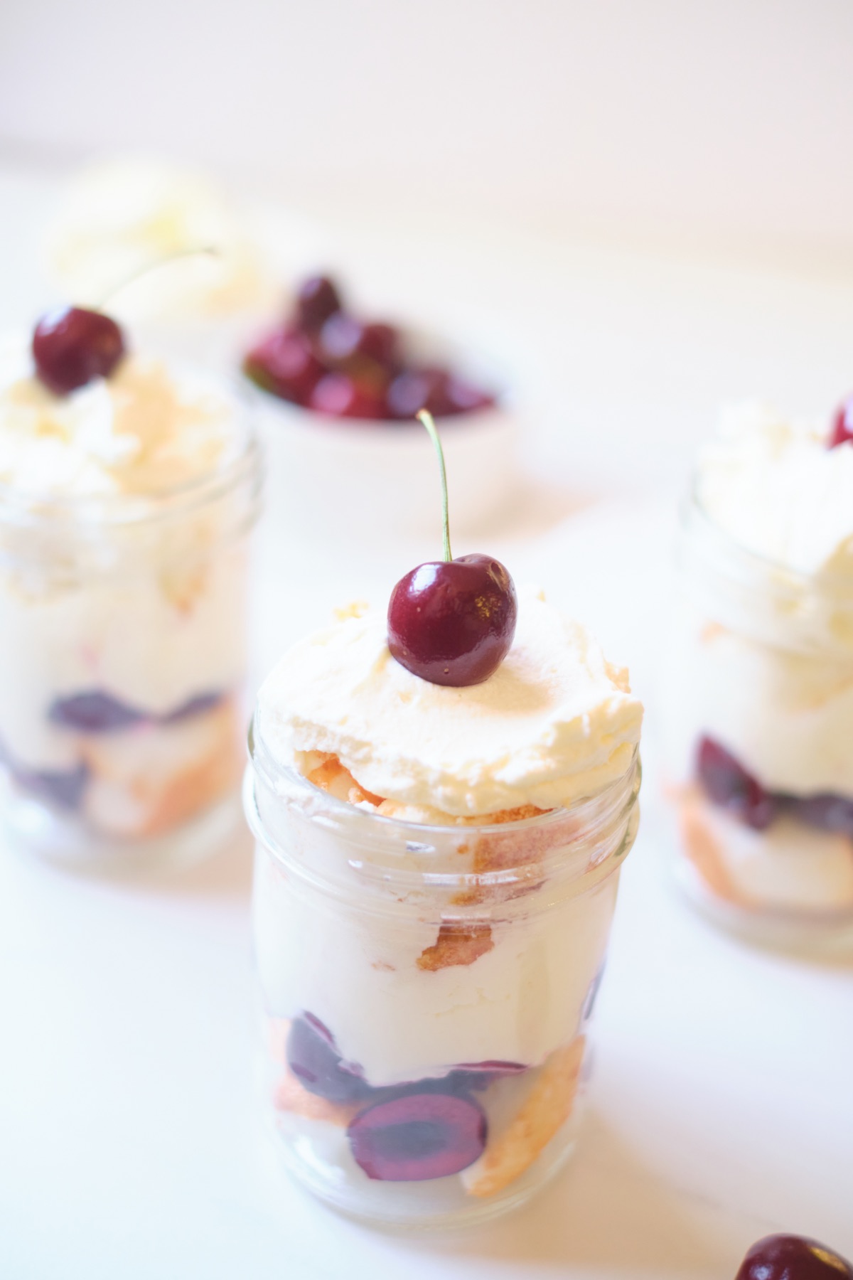 close up of the cherry and angel food cake parfaits